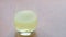 Yellow effervescent tablet of vitamin C dissolves in water