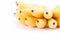 Yellow egg banana or hand of ripe golden bananas on white background healthy Pisang Mas Banana fruit food isolated