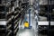 Yellow electric forklift reach truck on the background of a discolored warehouse