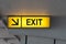 Yellow Electric sign Exit on ceiling