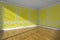 Yellow empty room with molding and parquet