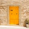 Yellow entrance door.