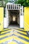 Yellow entry to walk way like tunnel