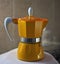 Yellow espresso maker