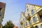 Yellow European style buildings in blue sky of sunny winter afternoon