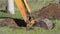 Yellow excavator on a construction site