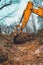 A yellow excavator in the forest digs a pit for a pond