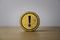 Yellow exclamation caution sign or warning symbol print screen on round wooden block on dark background for notification error and