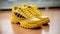 Yellow faux leather sneakers with dragon elements, trendy color and fashionable style, shoe store
