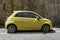 yellow Fiat 500 car