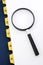 Yellow file divider and magnifier