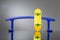 Yellow fingerboard and metal rail for riding small skateboards