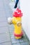 Yellow fire hydrant in street reykjavik iceland. Fire hydrant also called fireplug can tap into water supply. Active