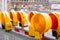 Yellow flashing light standing at road construction site. Road works concept.