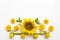 Yellow flowers cosmos, marigolds and  sunflowers arrangement flat lay postcard style