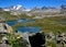 Yellow Flowers, lakes and mountains in the Nivolet plan - Gran Paradiso National park - Italy