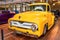 Yellow Ford pickup truck hot rod