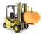 Yellow fork lift truck lifts orange pupmkin