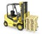 Yellow fork lift truck, with stack of pallets
