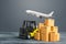 Yellow Forklift truck and cardboard boxes and freight plane. Production, transport, cargo storage. Freight shipping. retail.