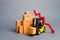 Yellow Forklift truck with cardboard boxes and a red arrow down. Concept drop in industrial production and business. economic