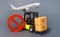 Yellow Forklift truck carries boxex and a red prohibition symbol NO. Embargo trade wars. Restriction on importation production