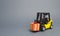 Yellow forklift truck carries a gift with a red bow. Purchase and delivery of a present. retail, discounts and contests