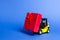 Yellow forklift truck carries a red gift box with a bow. Purchase and delivery of a present. retail, discounts and contests.