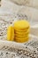 Yellow French macaron on vintage doily