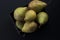Yellow fresh pears on wooden background top view sackcloth and p
