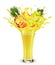 Yellow fruit juice splash. Whole and sliced pineapple, mango, peach and grape  in a sweet yellow juice