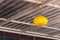 Yellow glass lamp railing on top of the building with a ceiling