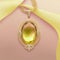 Yellow Gold Pendant with Bright and Vibrant Lime Quartz Center Stone, surrounded by Glittering Diamonds