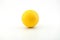 A yellow golf ball