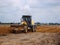 Yellow grader machinery