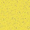 Yellow and gray hand crafted terrazzo pattern background. Backdrop of dense coarse grained stone granite particles