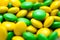 Yellow And Green Bean Shaped Confectionery Closeup