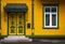 Yellow and green facade in PÃ¤rnu, the fourth largest city in Estonia