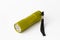 Yellow-green led aluminum flashlight on a white background