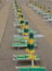 Yellow and green loungers and umbrellas along an Italian beach