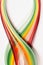 Yellow, green, orange and red paper stripes on white background; abstract lines background