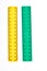 Yellow and green plastic rulers.