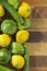 Yellow and green squashes with zucchini on the wooden board