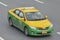 Yellow and green Thai taxi
