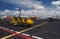 Yellow gyroplane in the international airport