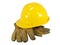 Yellow hardhat and old leather gloves