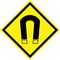 Yellow hazard sign with magnetic field