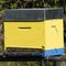 Yellow hive with bees