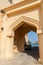 Yellow house facade with classical Arabic arch