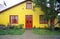 Yellow house in rural Andes Mountains, Tierra del Fuego National Park, Ushuaia, Argentina